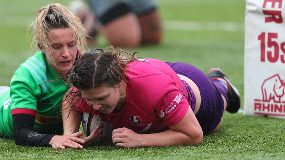 two rugby players on the pitch